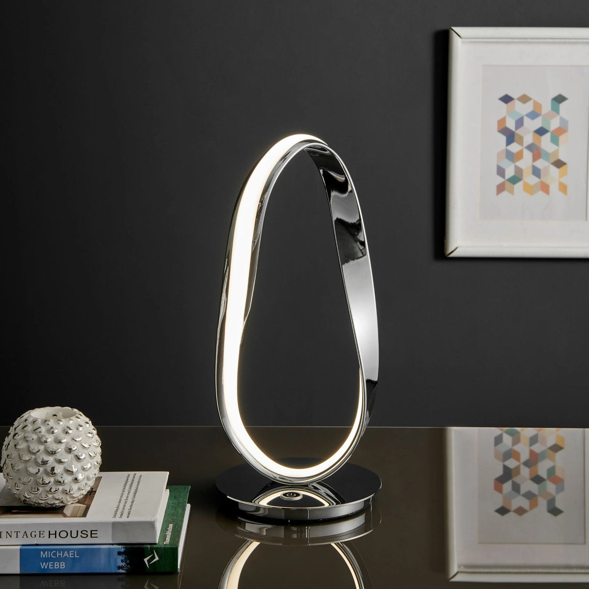 This modern table lamp offers a bright LED light for your room.