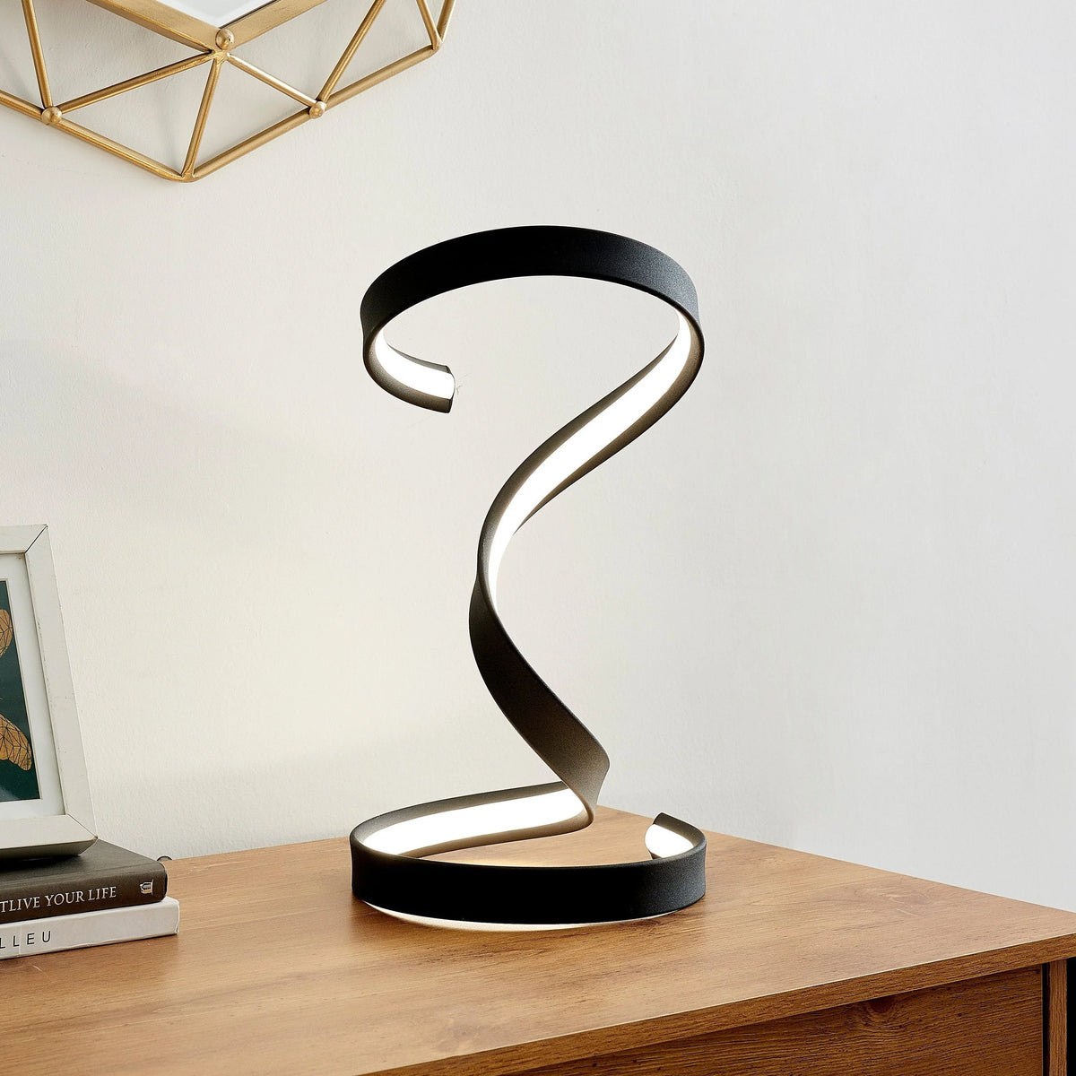 The Hamburg Black Table Lamp makes a fantastic choice for your modern living area.