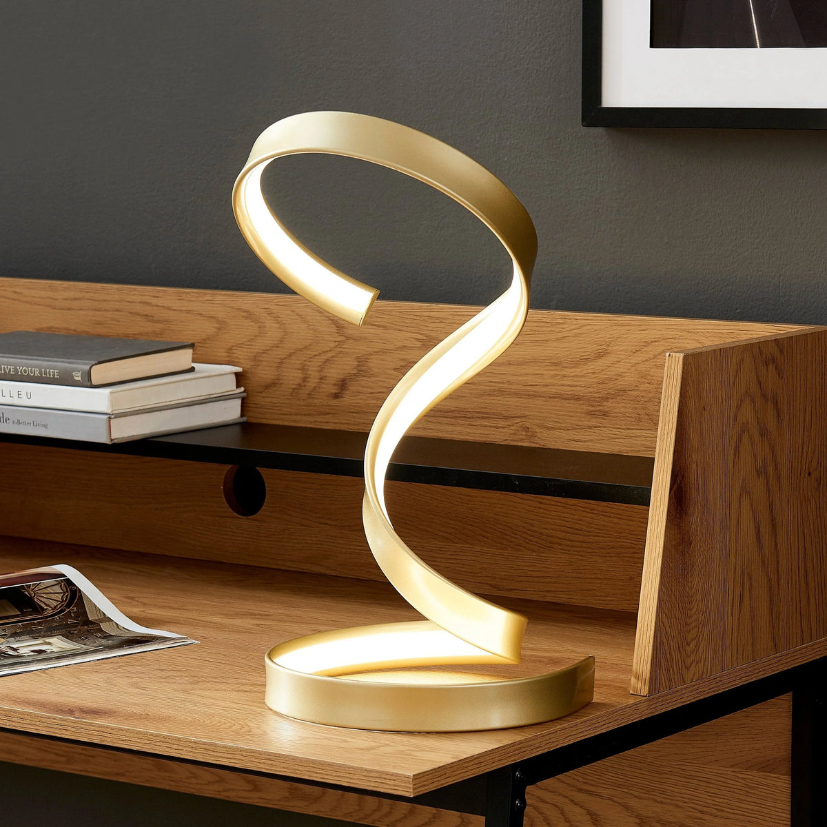 Tthe Hamburg Gold Table Lamp will look stunning on your office desk.