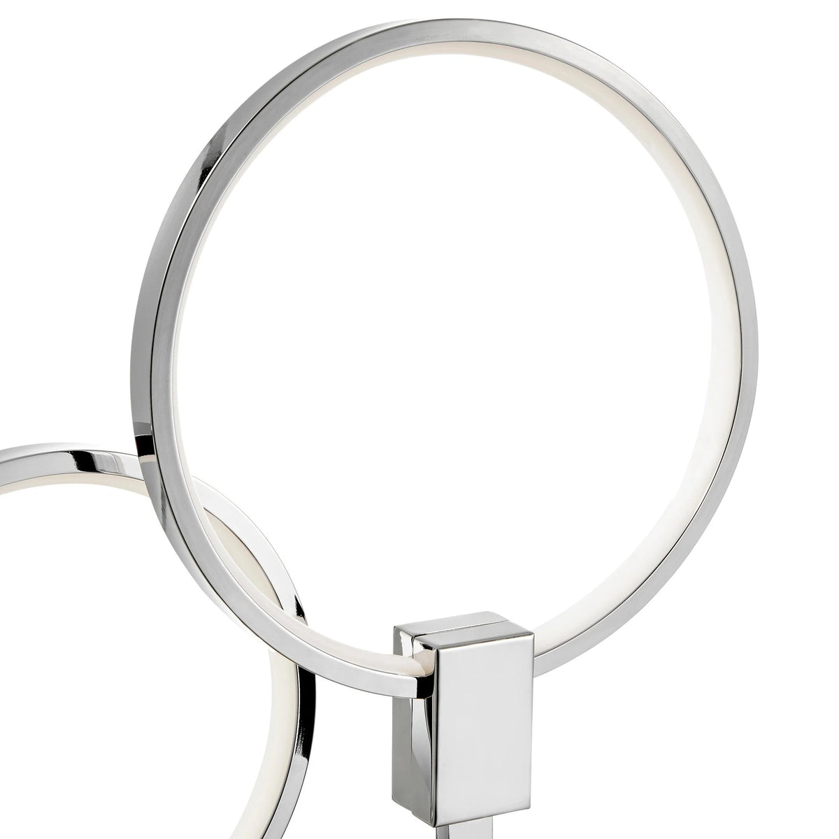 The Hong Kong Chrome Table Lamp has bright integrated LED circular strips encased.